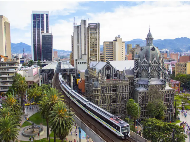 Medellín city skyline with green mountains and modern buildings in Colombia